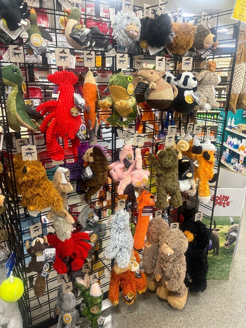 A rack of plush dog toys